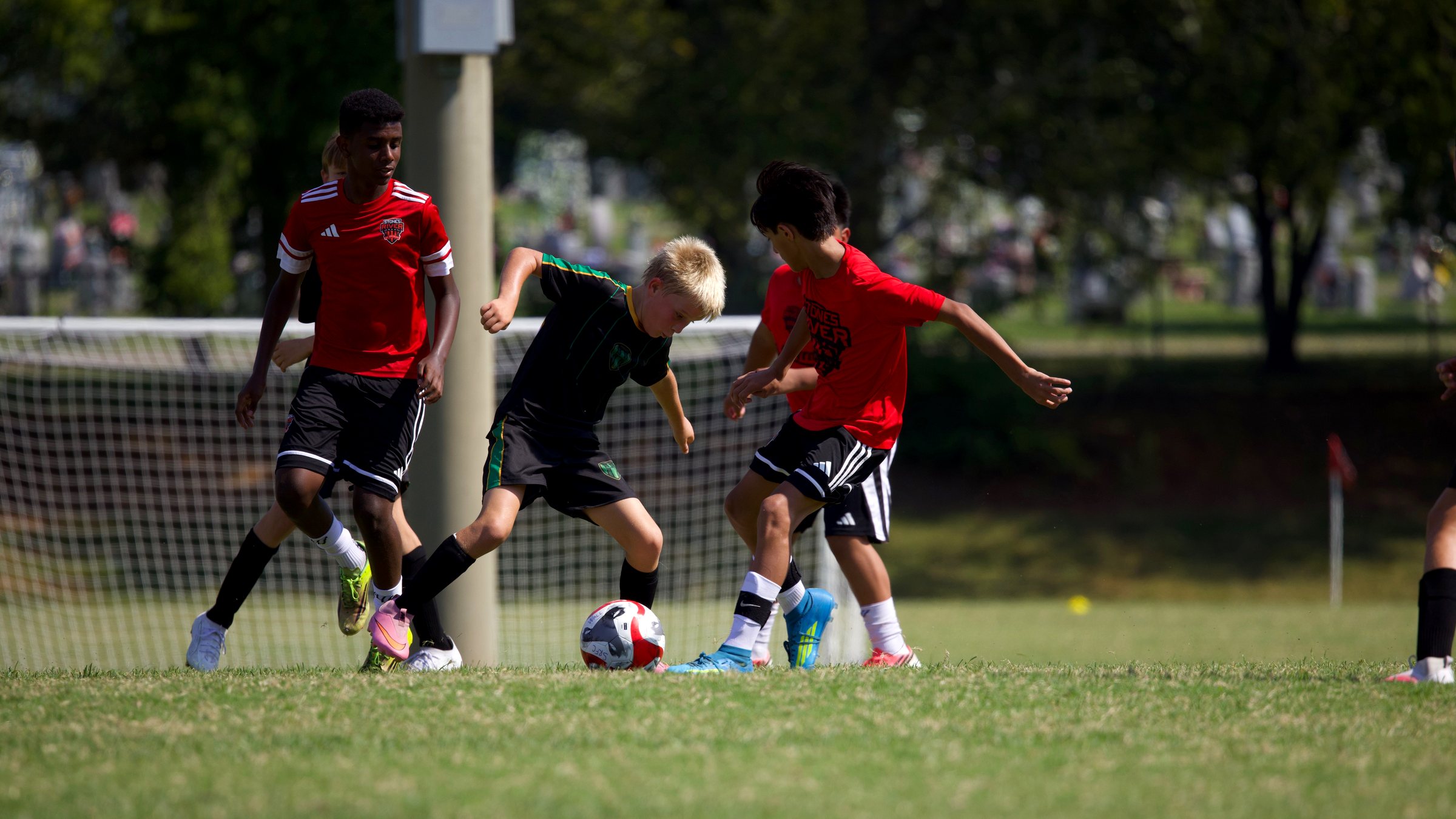 Rayo 615 players competing for the ball in training